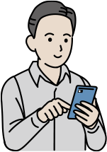 スマホを操作する男性